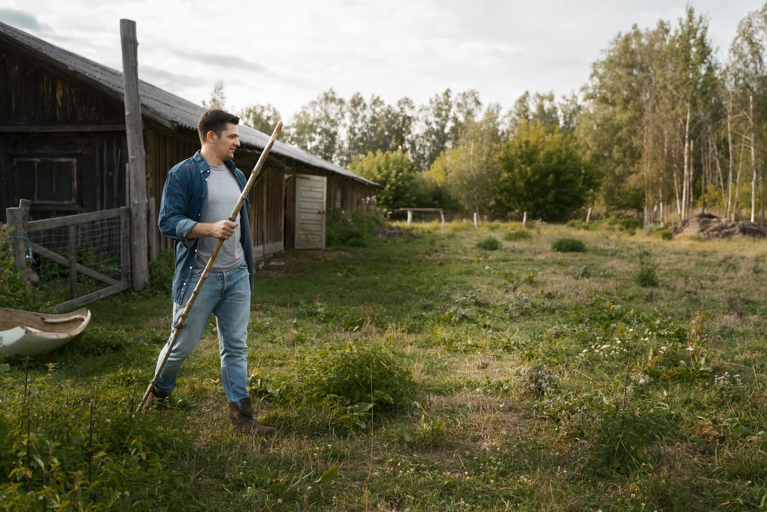 Professional lawn aeration equipment is preparing a patchy Pennsylvania yard for Overseeding.